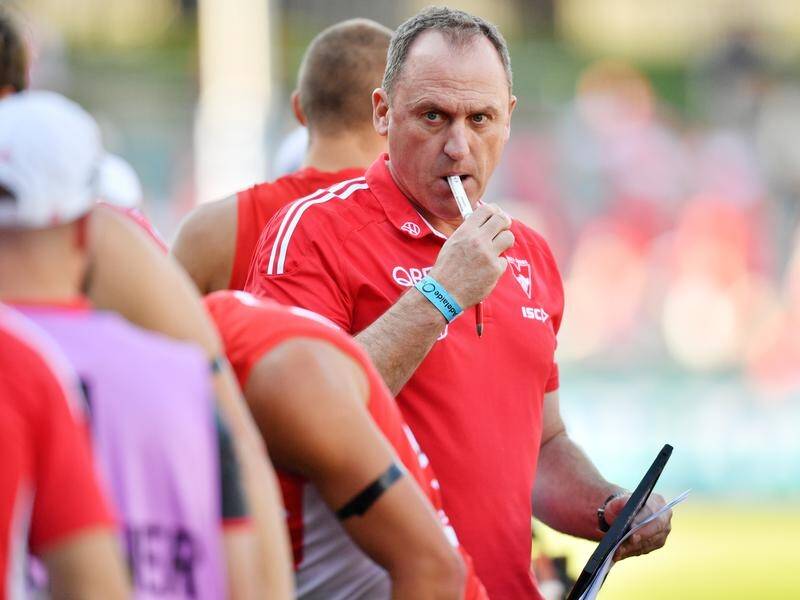 Coach John Longmire says his young Sydney side will learn a lot from their AFL loss to Brisbane.