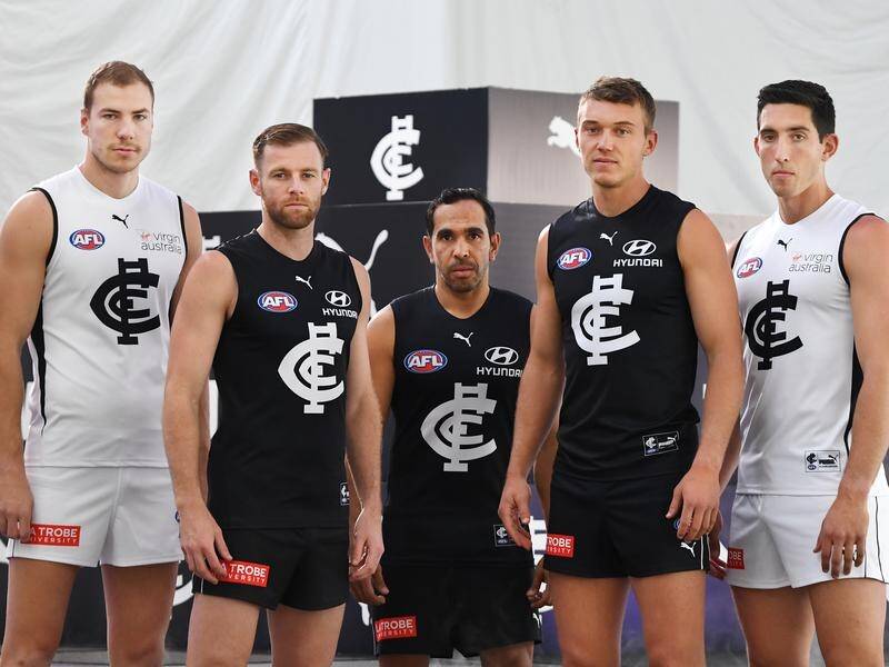 Carlton's Patrick Cripps (2R) wants player workforce experience if the AFL pre-season is shortened.