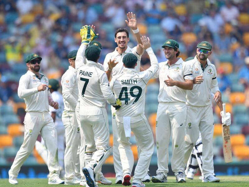 Mitchell Starc missed a hat-trick but Australia still ruled day one against Pakistan at the Gabba.