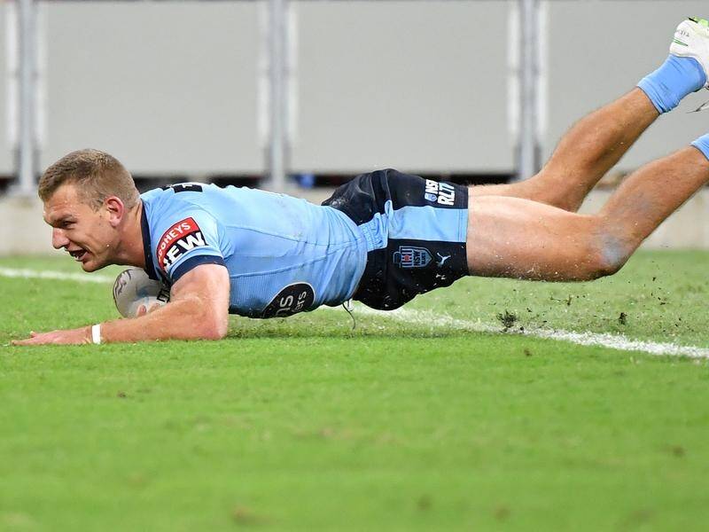 Tom Trbojevic scores one of three tries for NSW in their big State of Origin win over Queensland.