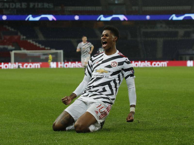 Marcus Rashford celebrates his winning goal for Manchester United in their 2-1 ECL win over PSG.