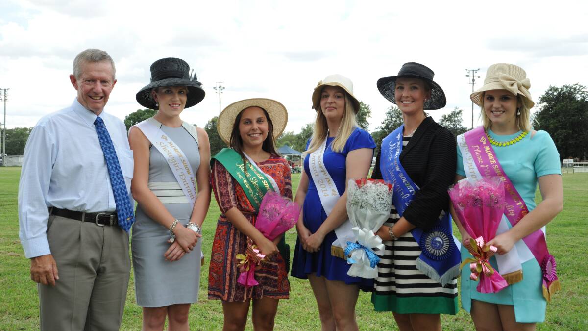 Mark Coulton with the showgirls; Hayley Farrell, Jessica Duncan, Telisha Lysaught, Amber Boydell and Sarah-Jane Hobday.