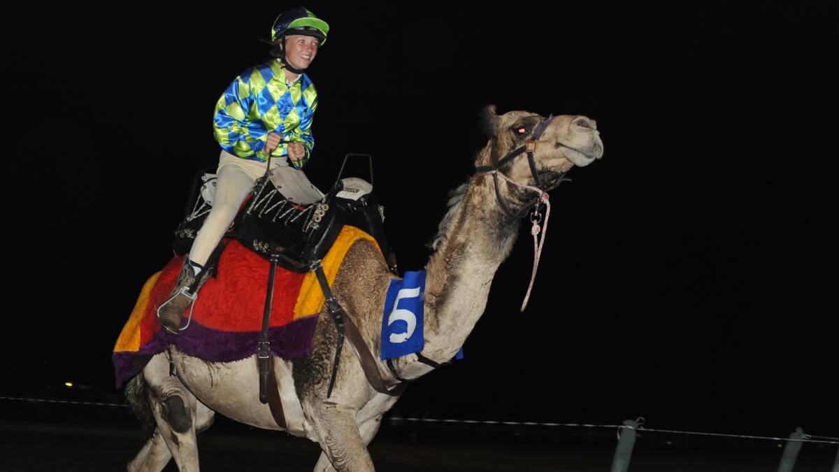 Jess Towns takes out the final of the camel races.