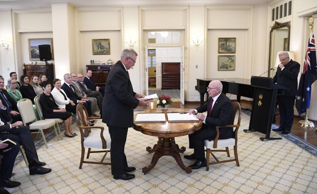 Federal Minster for Parkes Mark Coulton being sworn in by Governor-General David Hurley. Photo: CONTRIBUTED