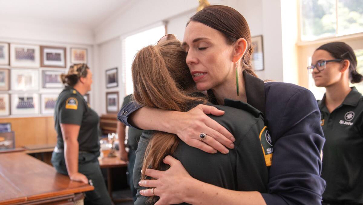 Prime Minister Jacinda Ardern meets with first responders at the Whakatane Fire Station following the volcanic eruption at White Island. Picture: Getty Images