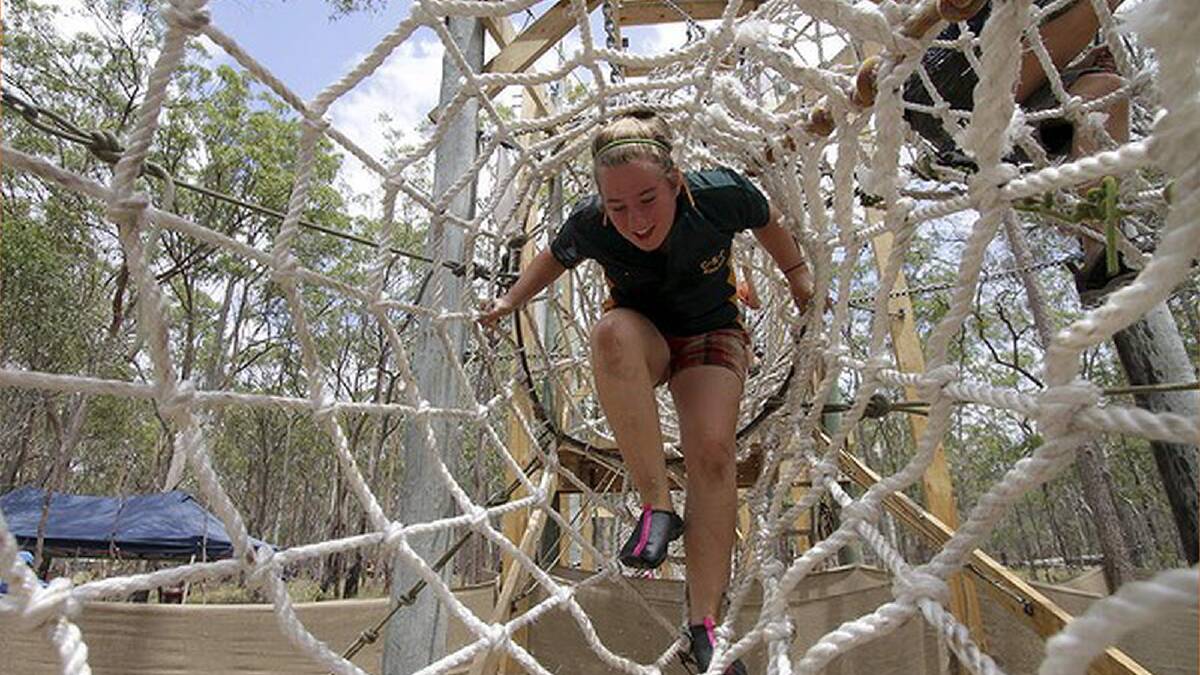 Stevie Ashley-Cooper, 15, from Wulguru, Townsville, QLD, goes through the obstacle course. Photo: Michelle Smith